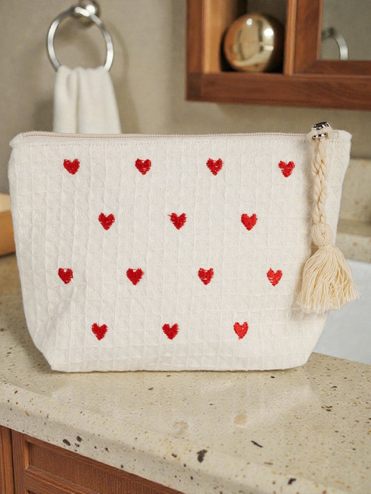 Trousse cœurs brodés