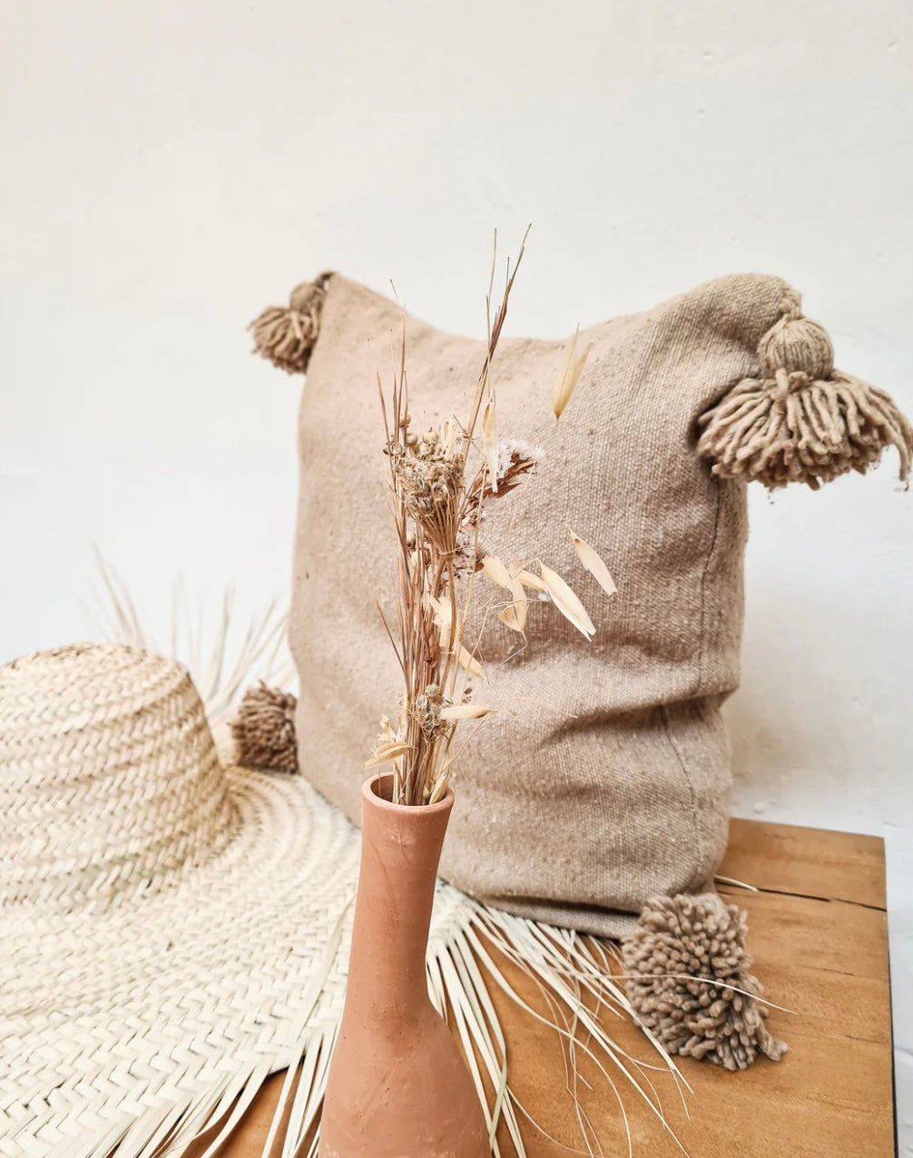 Coussin à pompons Beige